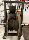 Portable Wire Rack Dispenser With 3 Rolls of wire as pictured