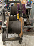 Portable Wire Rack Dispenser With 3 Rolls of wire as pictured