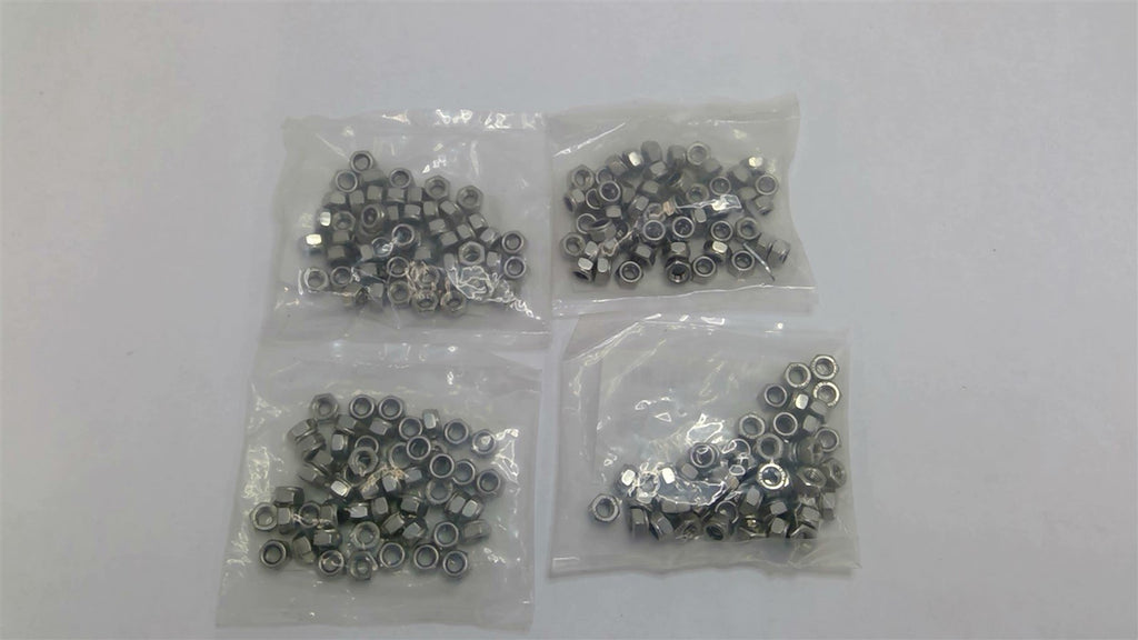 W.W. GRAINGER M6-100 Gr A4 SS Plain Lock Nut Package of 50 Lot Of 4