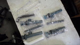 LOT OF ASSORTED RESTROOM REPLACMENT PARTS SELLING AS PCITURED