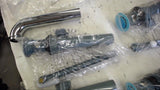 LOT OF ASSORTED RESTROOM REPLACMENT PARTS SELLING AS PCITURED