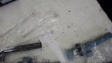 LOT OF ASSORTED RESTROOM REPLACMENT PARTS SELLING AS PCITURED